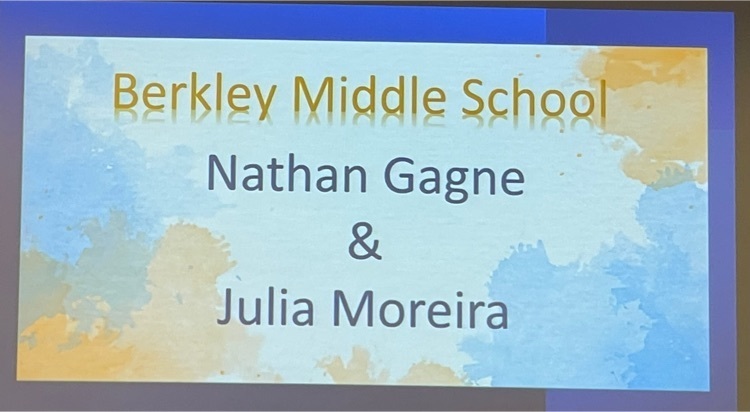 blue a yellow sign that reads Berkley Middle School Nathan Gagne and Julia Moreira