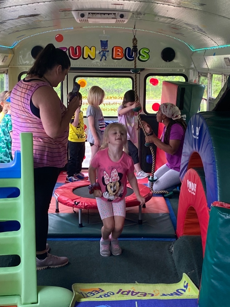 students playing on the fun bus 