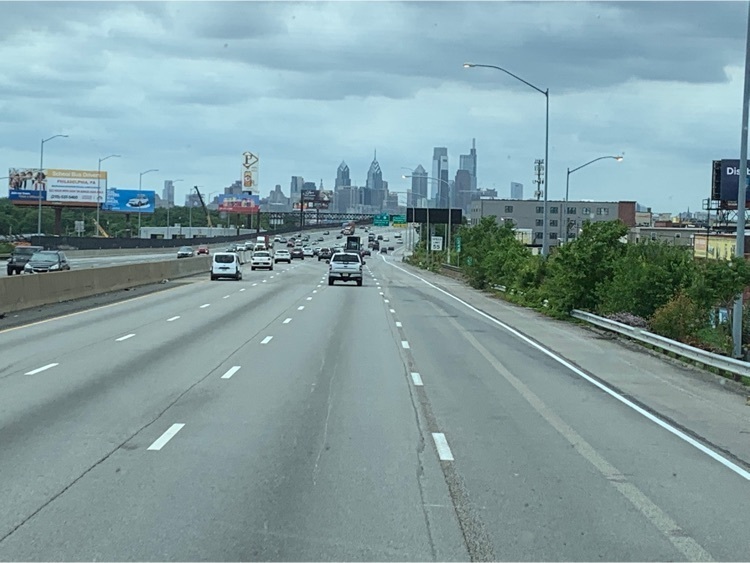 the view of Philadelphia skyline from the highway 