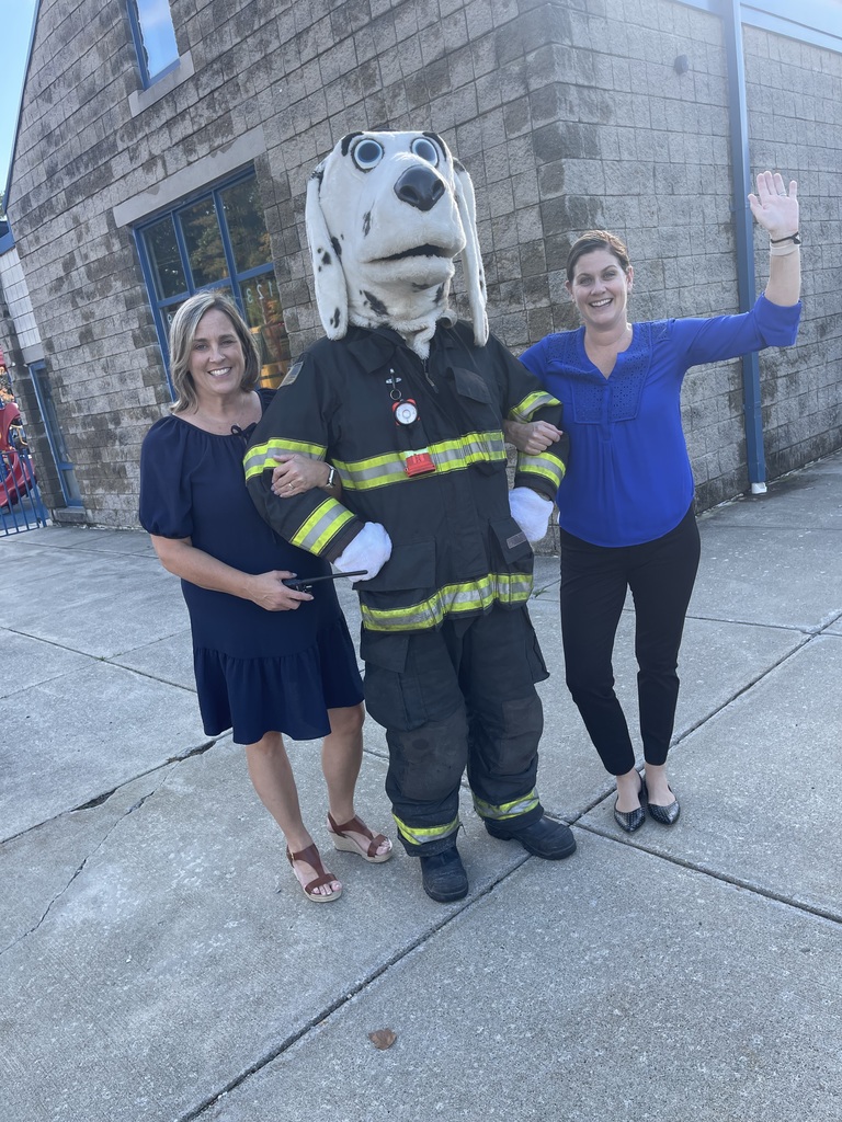 Principal Francisco and Assistant Principal Cogar with Sparky the Fire Dog