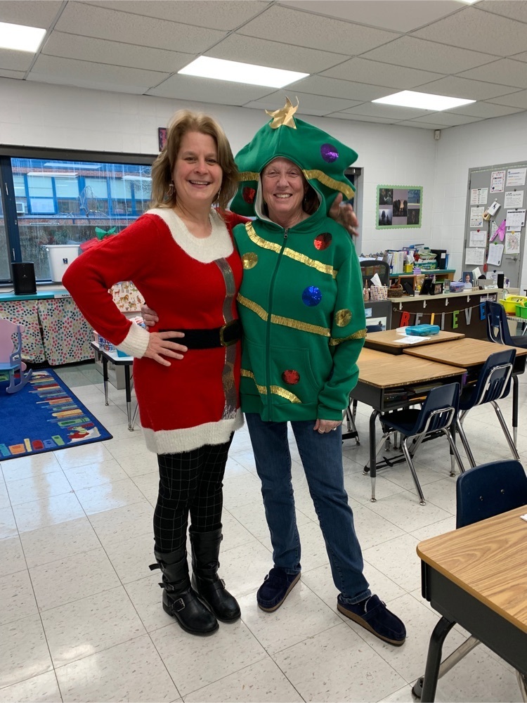 Ms. Como and Ms. Mickune-Santos in the holiday spirit 